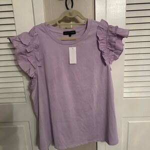 New with tags lilac ruffle top.